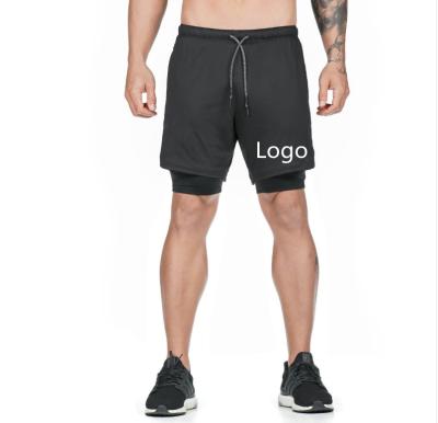 China Custom QUICK DRY 2 Logo Sports Tights Wholesale Running Shorts Mens Shorts In 1 Men's Shorts for sale