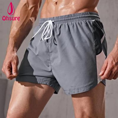 China Custom Anti-wrinkle OEM Logo 95% Polyester, 5% Spandex Mens Colorblock Drawstring Gym Sports Running Shorts for sale