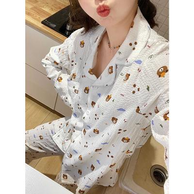 China Breathable Wholesale matching family pajamas, soft and comfortable simple cardigan cartoon pajamas, women's pajamas set for sale