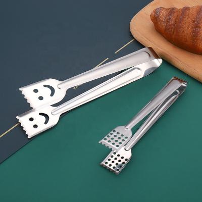 China Sustainable Smile Shape Stainless Steel Food Bread Tongs For Kitchen Use Grill BBQ Tongs for sale