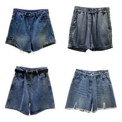 China Breathable Womens Denim Shorts Summer Mid Waist Ripped Raw Cut Edge Distressed Stretch Jean Shorts for sale