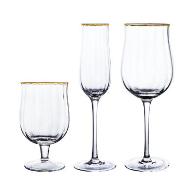 China New Wholesale Tumbler Glass Cup Tumbler Set Tulip Shaped Glassware Gold Rim Vertical Stripe Ripple Factory Classic/Postmodern For Water/Wine/Champagne for sale