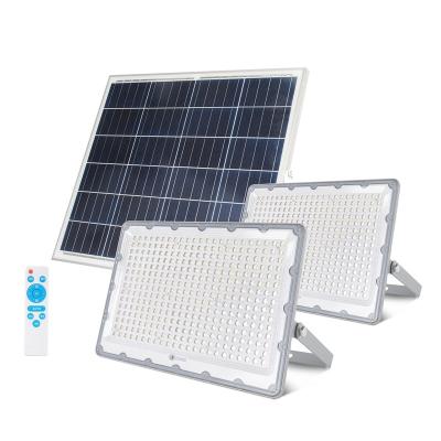 China Industrial Led LANDSCAPE Street Solar Power Lamp Rechargeable Waterproof Outdoor Photocell Remote Control Solar Flood Light for sale