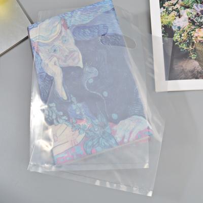 China Barrier Goods Gift Carrier Bags With Logo Plastic Shopping Clear 24x24 Die Cut Clear Plastic Plastic Bags Gift Bags Wholesale for sale