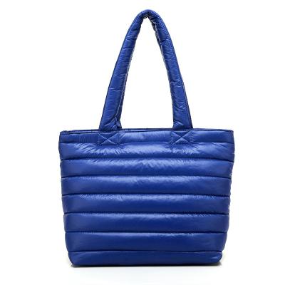 China Durable Handbag Color Quilt Blue Stitch Down Fabric Stripper Handbag Waterproof Fashion Nylon Women Lightweight Puffy Tote Bag for sale