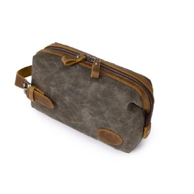 China Wholesale Heavy Waxed Genuine Leather Canvas Waterproof Goods Daily Travel Make Up Toiletry Bag Waterproof Cosmetic Bag With Logo for sale