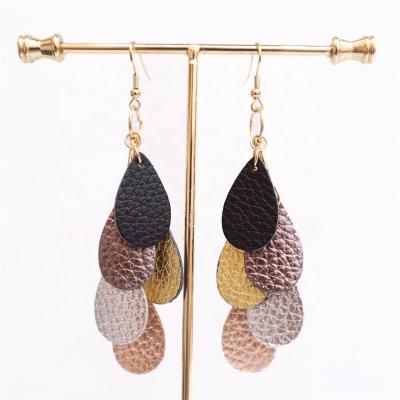 China Environmental Friendly Fashion Light Sparkles Dangle Teardrop Leopard Print Long Genuine Leather Earrings Fast Delivery Jewelry For Women for sale