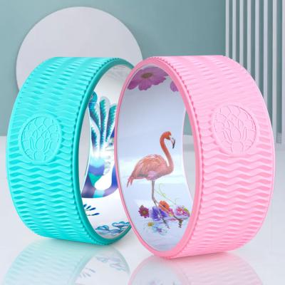 China Custom Fitness Eco-friendly Logo Wholesale Back Stretch Roller Yoga Training Wheel For Body Balance for sale