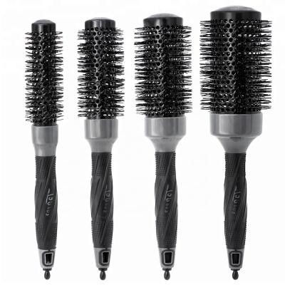 China Round Barrel Aluminum Tail Comb Ionic Ceramic Round Brush for sale