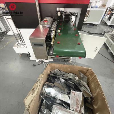 China 100 Pcs/Min KF94 KF94 Medical Face Mask Packaging Machine Face Mask Packaging Machine Masks for sale