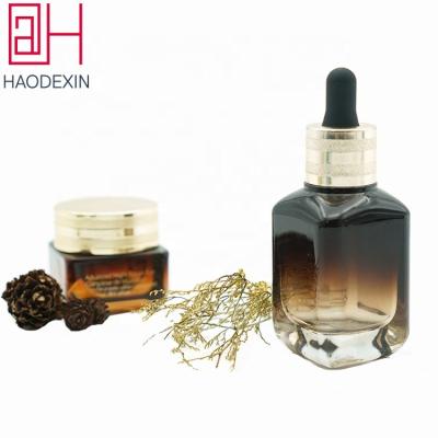 China HAODEXIN 30ml Essential Oil Square Fashion Cosmetics Packaging Glass Dropper Bottles Customize Cap Dropper Essential Oil Wholesale Bottle for sale