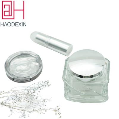 China Wholesale High Quality Clear Clear Empty Glass Cream Jar Packaging Skin Care Cream HAODEXIN 100ml Glass Container With Different Colors Metal Lids for sale