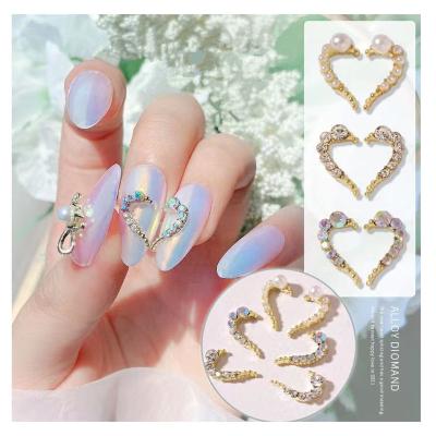 China Sparkle New Bqueen 2022 New Manicure Diy Left Right Heart Glass Rhinestone Half 3D Diamond Metal Beads Nail Charms For Nail Accessories for sale