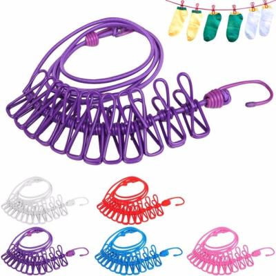 China Wholesale Adjustable Stretchable Clothesline with 12 Pegs Hanger String Drying Rack Portable Elastic Windproof Clothespins for sale