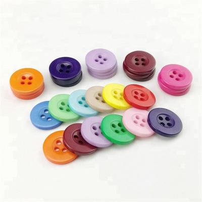 China Dry Cleaning Plastic Rims Big Round Colors 4 Holes Resin Sew Button for sale