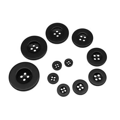 China Wholesale White Plastic Wide Holes Edge Four Holes Dry Cleaning Resin Promotional Buttons Coat Jacket Garment Button For Clothing Shirts for sale