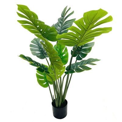 China Wholesale Oriental Monstera Plastic Leaf Artificial Tree With Pot For Home Wedding Decor for sale