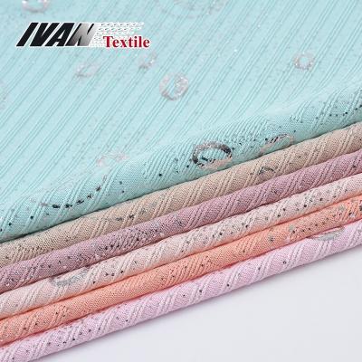 China Customs Services Jacquard Spandex Polyester Tear-Resistant Plain Dyed Knitted Fabric With Silver Foil for sale