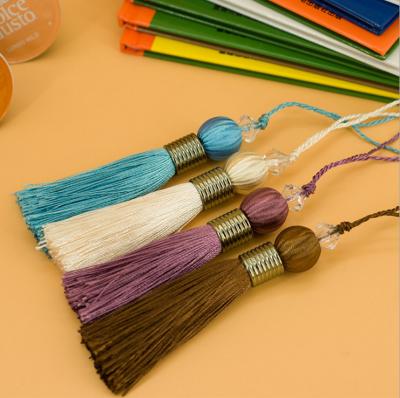 China Decorative Curtain Wooden Beaded Tassel Trims Fringe Brush Tassel Fringe Wholesale Leather Tassels for sale