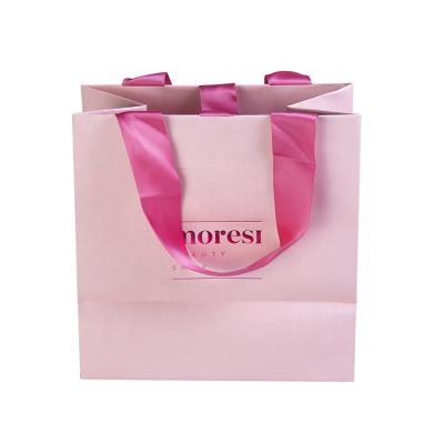 China Wholesale High Quality Custom Recyclable Logo Beauty And Skincare Gift Shopping Bags Luxury Paper Bags With Ribbon Handles for sale