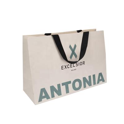 China Wholesale Recyclable OEM Color Luxury Gift Paper Shopping Bag For Clothing Packaging for sale