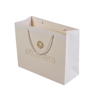 China Recycled Materials Customized Logo Printing Luxury Gift Shopping Paper Bag With Handles for sale