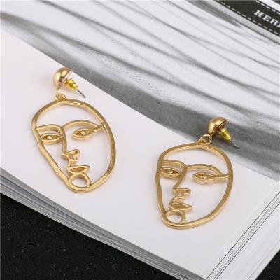 China 2020 fashion unique design jewelry wholesale minimalist gold plated hollow earrings funny abstraction face irregular earrings for sale