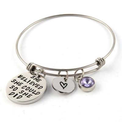 China Romantic She Believe Bangle Bracelet Adjustable Wire Engraved Alex Inspired Bracelet Charm Bracelets for sale