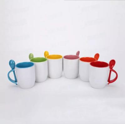 China Viable Sublimation Coated Spoon Sublimation Coffee Mug Blank Blank Handle Inner Handle Color Mug for sale