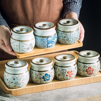 China Stocked Ceramic Seasoning Jar Sugar Salt Condiment Spice Pots Japanese Kitchen Accessories Set Set with Lid and Spoon for sale