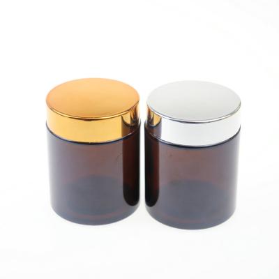 China Personal Care Purchasing Hot Sale 100g Festival Mini Jars Amber Glass Cosmetic Container Jars Jars With Lid for sale