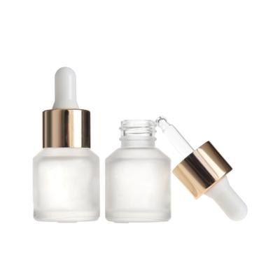 China Shoulder Cosmetic Skin Care Slope Packaging 15ml Essential Oil Frosted Clear Glass Bottle With Gold Dropper for sale