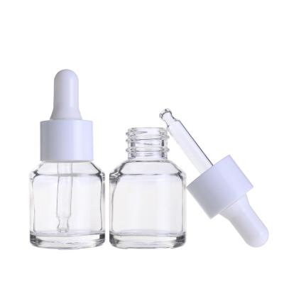 China Slope Cosmetic Cosmetic Shoulder Essential Oil Serum 15ml Clear Glass Bottle With White Dropper for sale