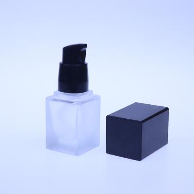 China Personal Care Cosmetic Packaging 15ml 20ml 30ml 40ml Frosted Square Base Bottles Glass Lotion Bottle With Pump Cap for sale