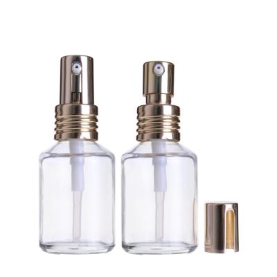 China 30ml 60ml 100ml 200ml 300ml Cosmetic Empty Olive Oil Clear Glass Pump Bottles For Oil With Cap for sale