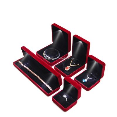 China Custom Luxury Elegant Stock Ring Box Velvet Led Jewelry Box Jewelry Display Gift Packaging Case For Proposal Engagement Wedding for sale