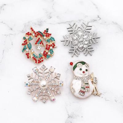 China Europe & North America Christmas Brooch Snowman Bell Snowflake Rhinestone Metal Rhinestone Brooch Pin Badge For New Year Gift Party Decor for sale