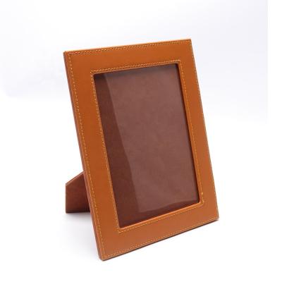 China Travel Handmade Leather Wooden PU Photo Frame Rectangle Yellow Photo Frame For Girl Or Family for sale