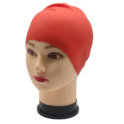 China Viable. Cost Effective Outdoor Pool Stocked Protect Elastic Waterproof Ears Silicone Swim Caps Manufacturer for sale