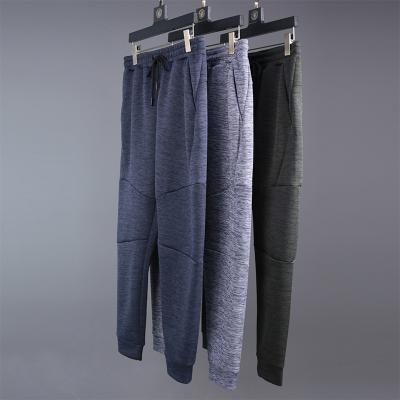 China Anti-pilling new trend of high quality solid color men's pants thickened plus velvet casual pants for men for sale