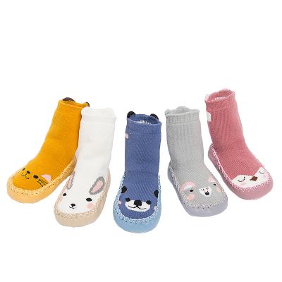 China Viable Wholesale Warm And Comfortable Terry Baby Socks Shoes With Leather Sole Non Slip for sale