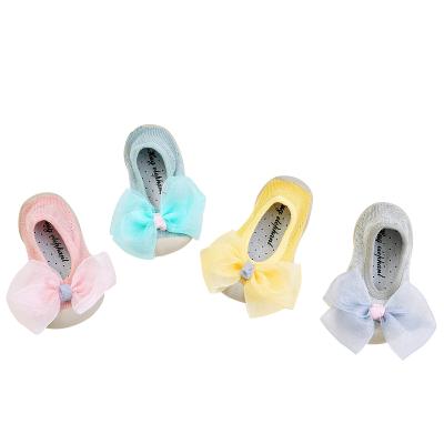 China Sustainable Anti Slip Bowknot Newborn Baby Socks With Kids Toddler Shoes Rubber Sole Socks for sale