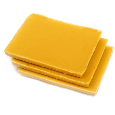 China Honey Smell High Bee Wax Supplier Bulk Bees Wax Wholesale Yellow Beeswax Block For Wax Therapy for sale