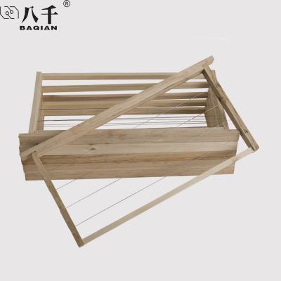 China Frame of Honey Flowing Wholesale Bee Wooden with Stainless Steel Wire Hive Equipment for sale