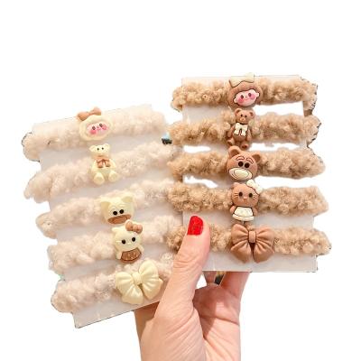 China New autumn and winter fashion plush cartoon teddy bear rope ponytail hair ring main hair accessories wholesale for sale