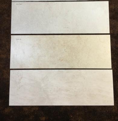 China Cheap glazed metallic tiles 300x450mm wall rak ceramic shiny tile for sale