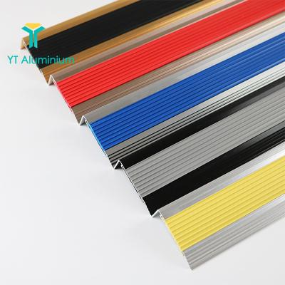 China Aluminum Step Tile Trim OEM 10mm 12mm Heavy Duty Black Anti-Slip Stair Nosing Flexible Rubber Insert Stair Nosing Profile for sale