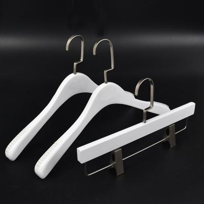 China Behind Doors/On Walls Fashion Shop Customized Logo High Quality White Brand Suit Wooden Hangers for Cloth for sale