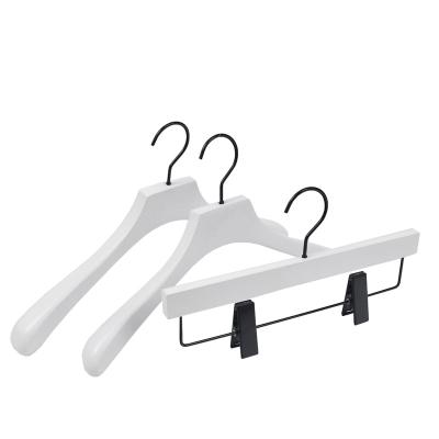 China Behind Doors/On Walls Custom Logo Hanger Flat Head Clips White Wooden Coat Hangers For Strip Store for sale