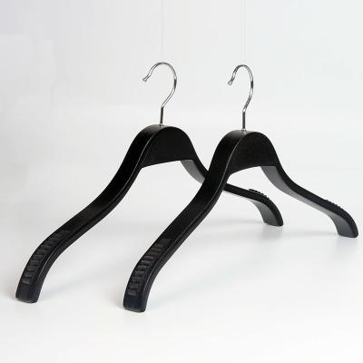 China Behind Doors/On Walls Black Laminated Wooden Hangers Clothes Laminated Hanger For Brand Store for sale